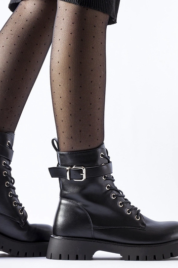 Stivaletti neri isolati con...