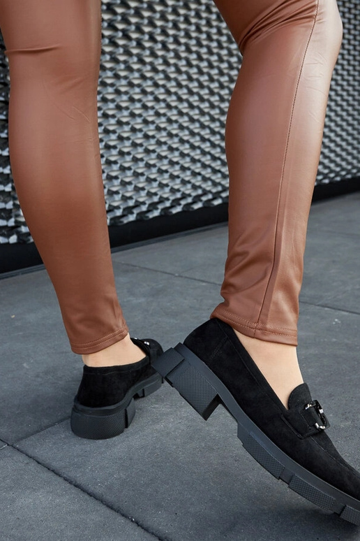 Mocassini neri massicci con fibbia...