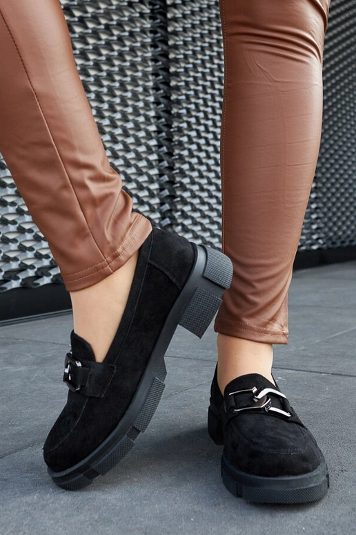 Mocassini neri massicci con fibbia...