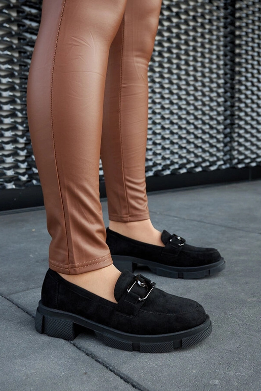 Mocassini neri massicci con fibbia...