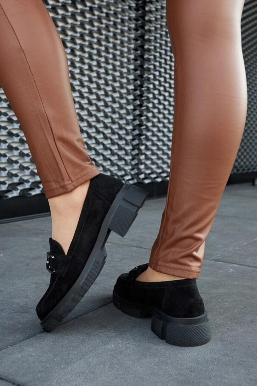 Mocassini neri massicci con fibbia...