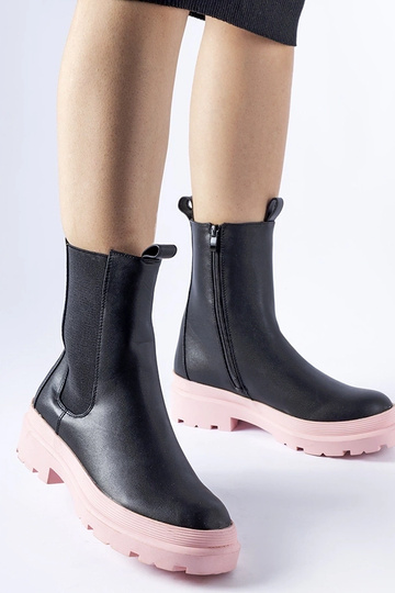 Stivaletti neri con suola...