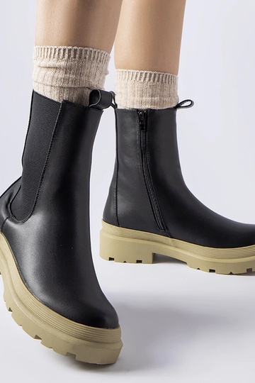 Stivaletti neri con suola...