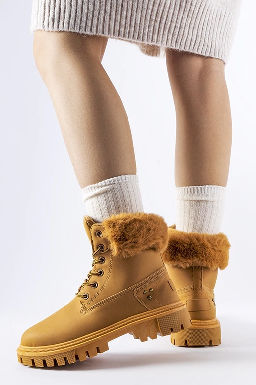 Stivali marroni con pelliccia...