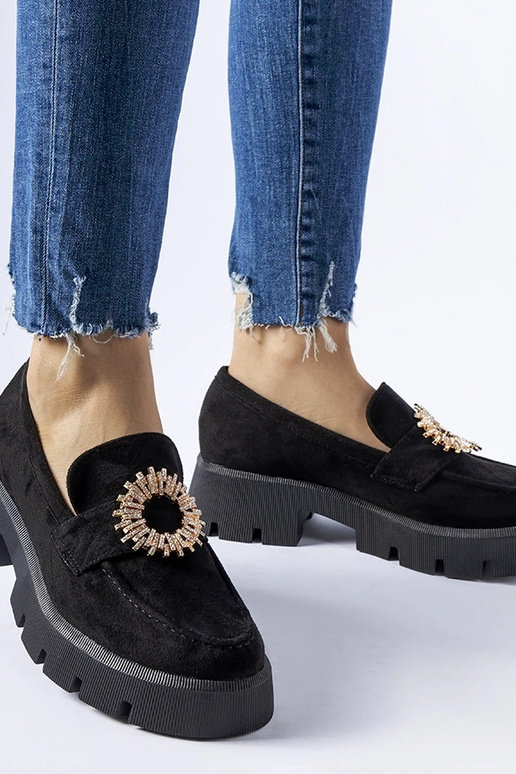 Mocassini neri decorati con fibbia...