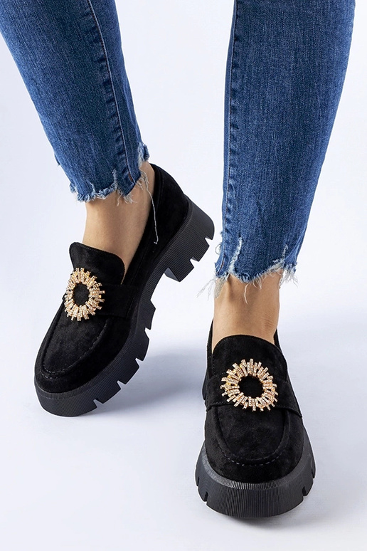 Mocassini neri decorati con fibbia...