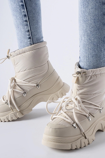 Stivali da neve beige isolati Aubine