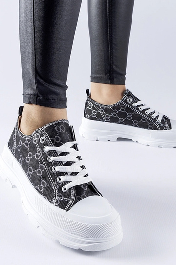 Sneakers nere decorate con...