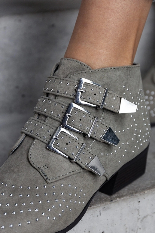 Stivaletti decorativi verdi con tacco...