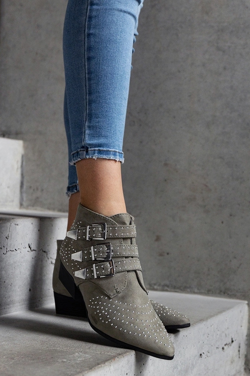 Stivaletti decorativi verdi con tacco...