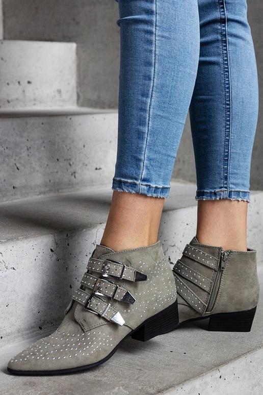 Stivaletti decorativi verdi con tacco...