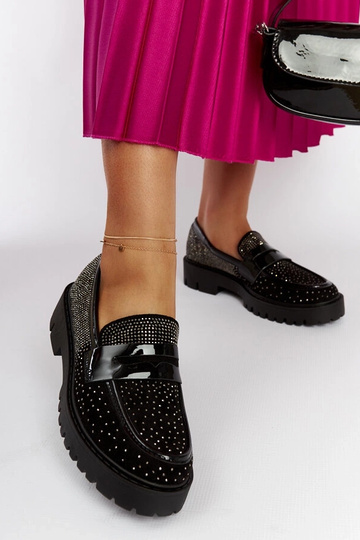 Mocassini neri decorati con...