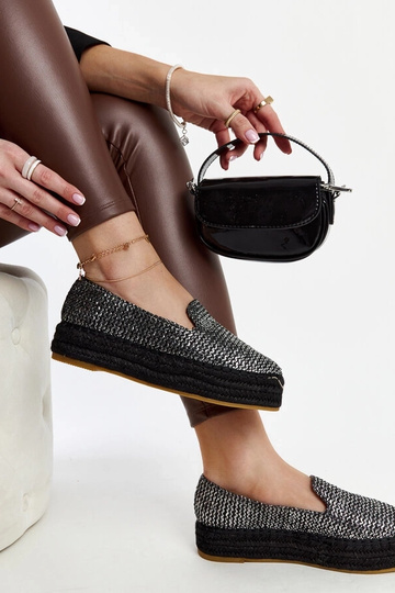 Espadrillas nere decorate...