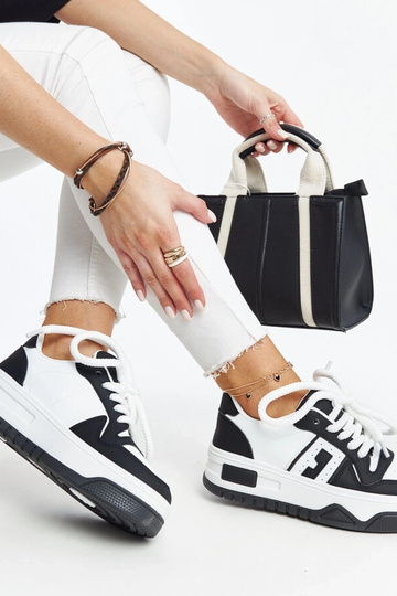 Sneakers nere e bianche con...