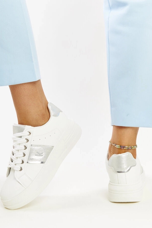 Sneakers bianche e argento con suola...