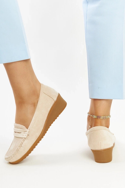 Mocassini con zeppa in pelle...