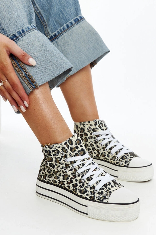 Sneakers alte leopardate con suola...