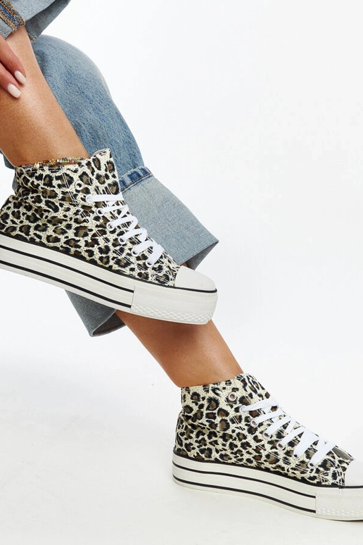 Sneakers alte leopardate con suola...