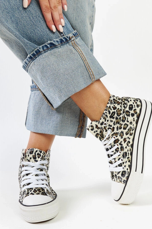 Sneakers alte leopardate con suola...