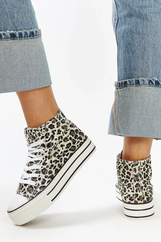 Sneakers alte leopardate con suola...