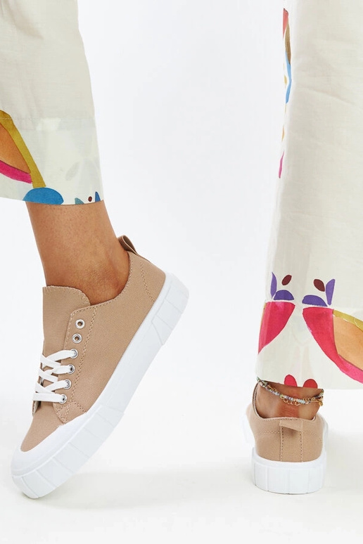 Le sneakers in tessuto marrone di Eduard