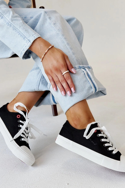 Sneakers da donna in tessuto nero...