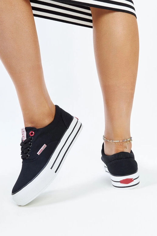 Sneakers da donna nere con suola...