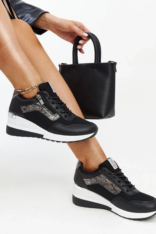 Sneakers con zeppa da donna nere...