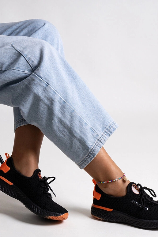 Sneakers in tessuto nero da donna...