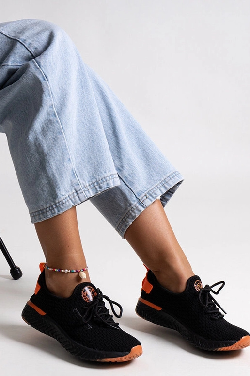 Sneakers in tessuto nero da donna...