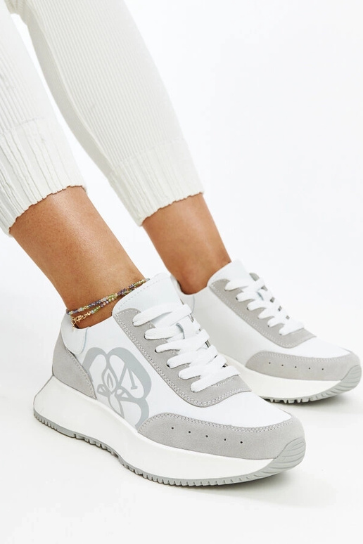 Sneakers in pelle bianche e grigie...