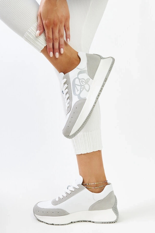 Sneakers in pelle bianche e grigie...