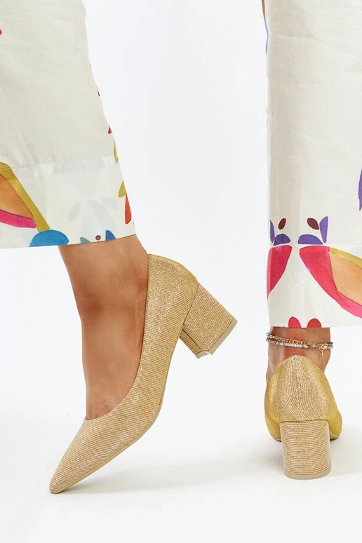 Décolleté dorati lucidi con tacco a...