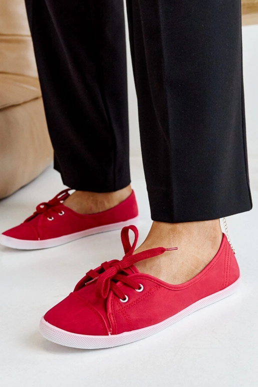 Scarpe sportive rosse allacciate in...