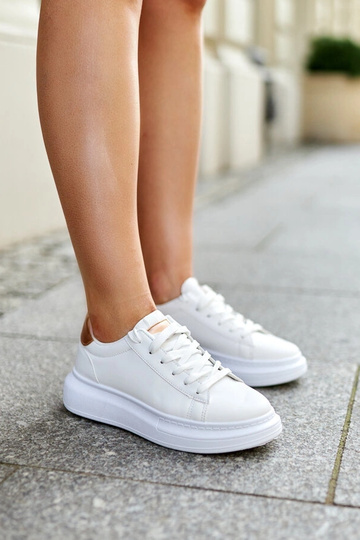 Sneakers bianche con suola...