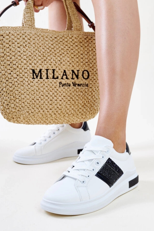 Sneakers nere e bianche con zirconi...