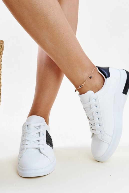 Sneakers nere e bianche con zirconi...
