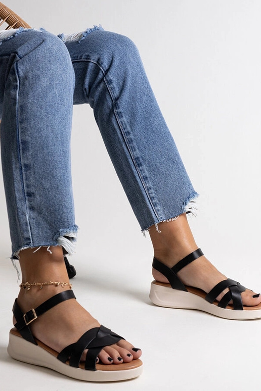 Sandali bassi con zeppa nera Khalida