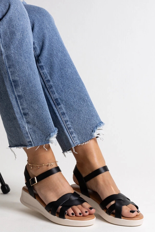 Sandali bassi con zeppa nera Khalida