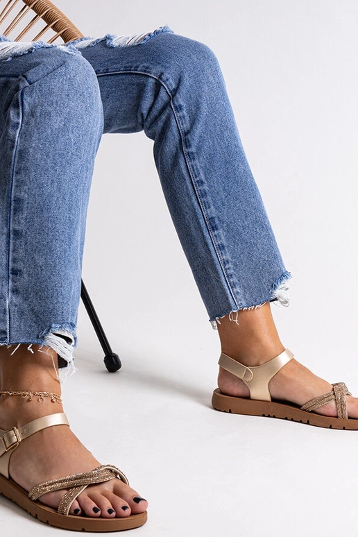 Sandali dorati decorati con zirconi...