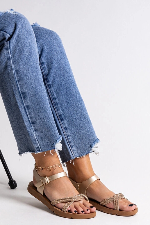 Sandali dorati decorati con zirconi...