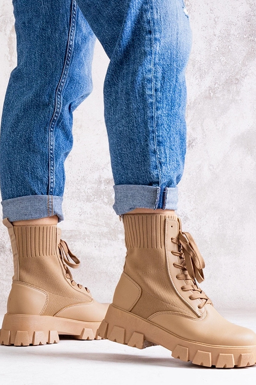 Stivaletti beige con gambale elastico...