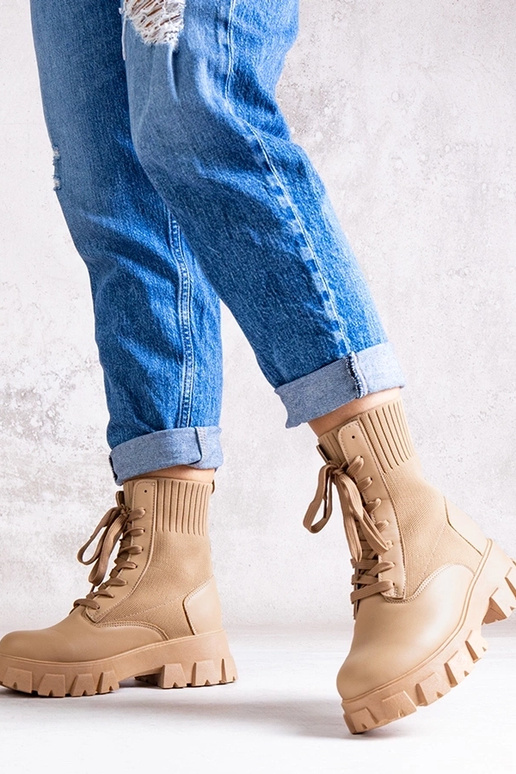 Stivaletti beige con gambale elastico...