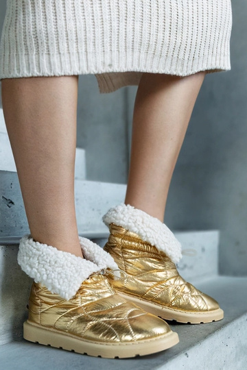 Scarponi dorati imbottiti...