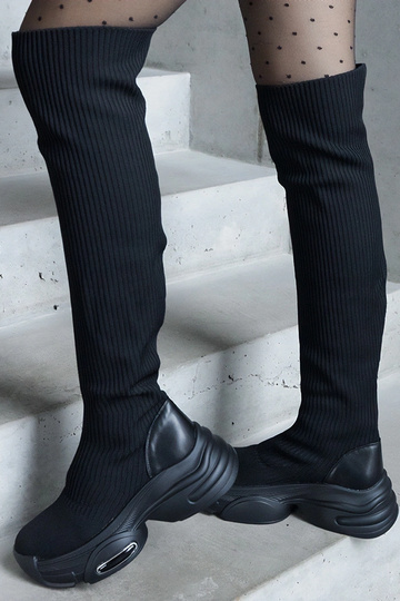 Stivali neri slip-on con...