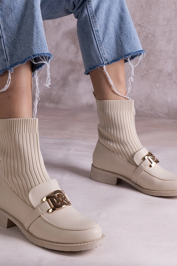 Stivaletti beige con tomaia...