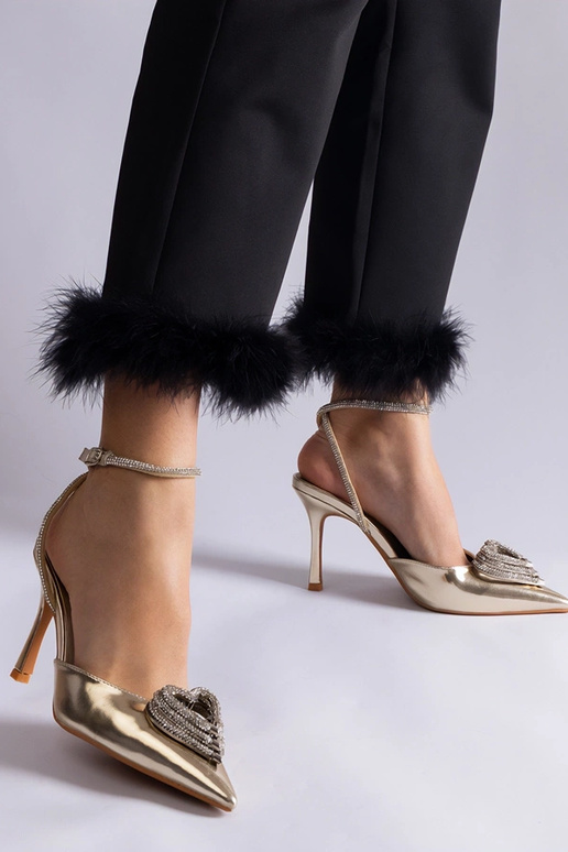 Décolleté dorate con tallone scoperto...