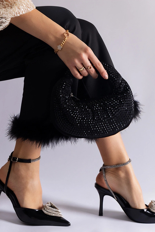 Décolleté nere con tallone scoperto...