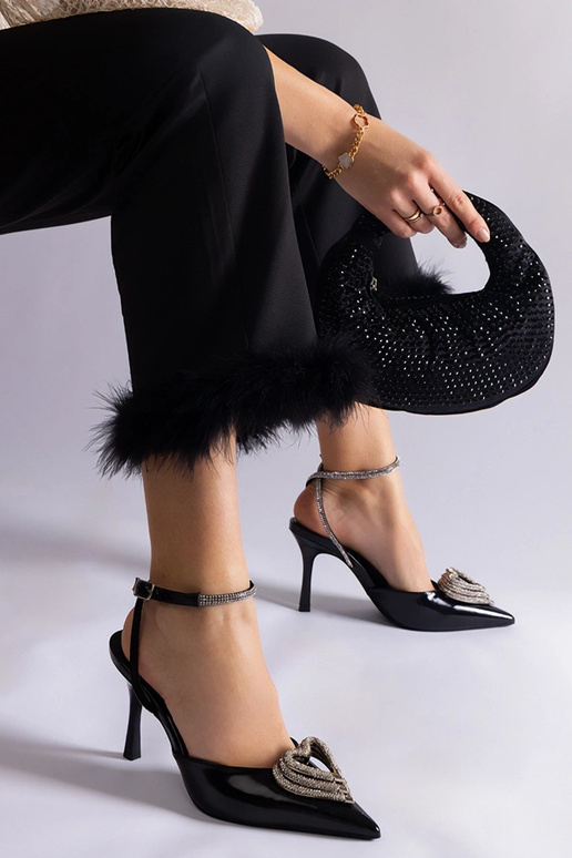 Décolleté nere con tallone scoperto...