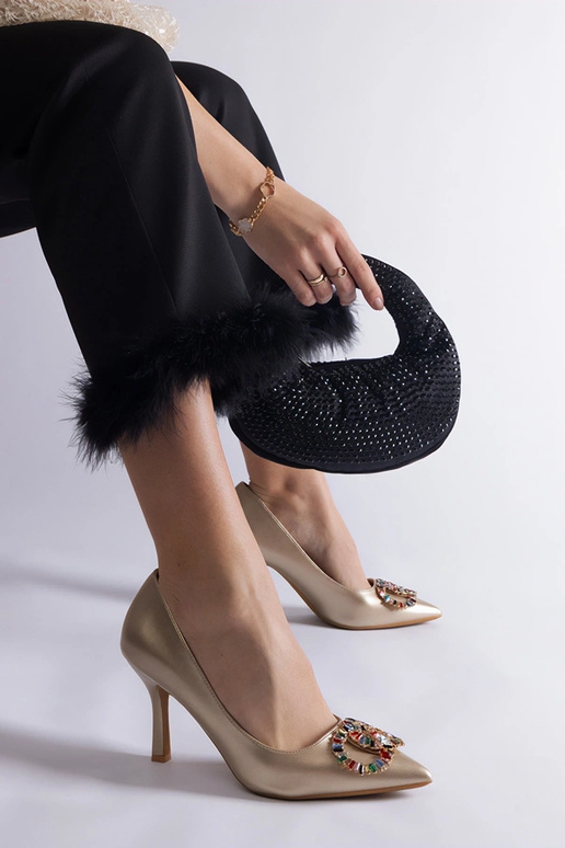 Tacco dorato decorato con zirconi...